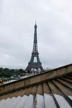France, Ile-de-France, Paris, Wet Steps With Eiffel Tower In Background