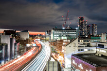 UK, England, Manchester, Long Exposure Of City Traffic At Night