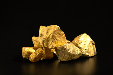 Sticker - The pure gold ore found in the mine on black background