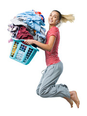 Happy woman doing laundry and jumping