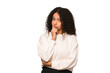 Young african american curly woman isolated unhappy looking in camera with sarcastic expression.