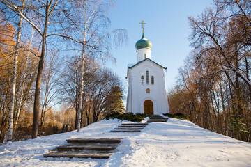 Christian church on a hill in a winter park