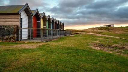 Sticker - Blyth Beach Huts and Gun Enplacement, situated on the promenade these colourful Beach Huts overlook the sandy beach and North Sea on the Northumberland coastline