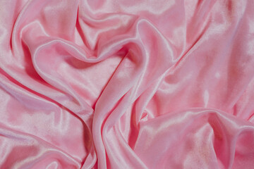 pink silk fabric background with heart. Valentine's day concept