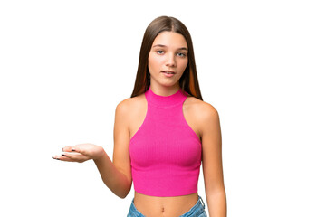 Wall Mural - Teenager caucasian girl over isolated background making doubts gesture