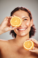Wall Mural - orange, beauty and woman face in studio with a smile for natural skin glow, cosmetic and dermatology