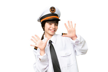 Wall Mural - Little girl as a Airplane pilot over isolated chroma key background counting ten with fingers