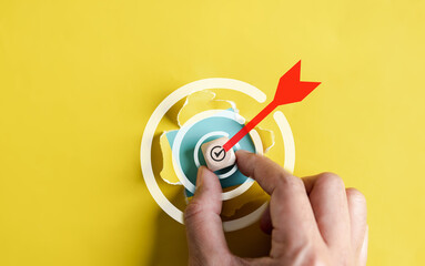 Aufkleber - Dartboard with arrow hiding of yellow punched paper, businessman target for planning business objective target to successful development, innovation, idea, creative.