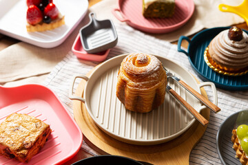 Wall Mural - Cinnamon rolls on plate and tableware	