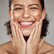 Beauty, face and portrait of a black woman model smile from facial and spa treatment. Studio background, isolated and wellness skincare of a person with happy skin glow from dermatology detox