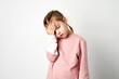 © Gecko Studio - Cute child girl tired having headache, white background
