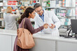 © Reese/peopleimages.com - Medicine, help and pharmacist advice with side effects at health store counter for customer service. Pharmaceutical advice and opinion of worker helping girl with medication information at pharmacy.