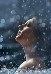 Wall Mural -  face of girl on a dark rainy background