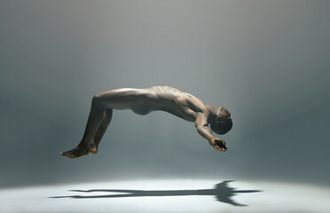 float, man and naked model in a white background studio for creative art with shadow. isolated, floa