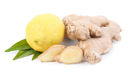 Fresh ginger roots and lemon on white background