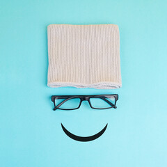 Wall Mural - Happy smiling face with eyeglasses and hat, mental health concept, positive mindset, support and evaluation symbol
