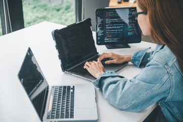 Female programmer working on coding, software development and web design.Concept technology development.
