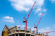 © youm - construction site with cranes