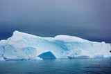 Fototapeta  - blue and white icebergs floating in Antarctica