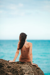 Poster - Young happy woman on the beach enjoy her summer vacation