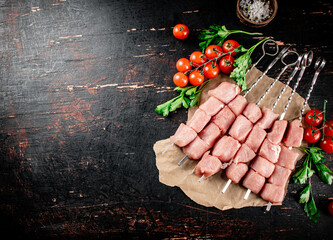 Poster - Pork kebab raw with parsley and cherry tomatoes.