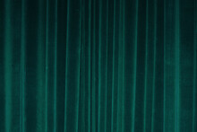 Vertical Fold On Green Velvet Curtains For Background And Design. Soft Focus