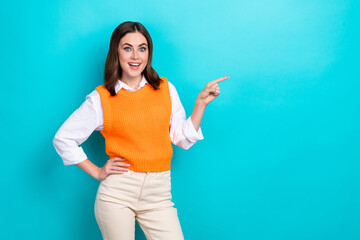 Sticker - Portrait of impressed astonished girl with straight hairdo wear white shirt directing empty space isolated on turquoise color background