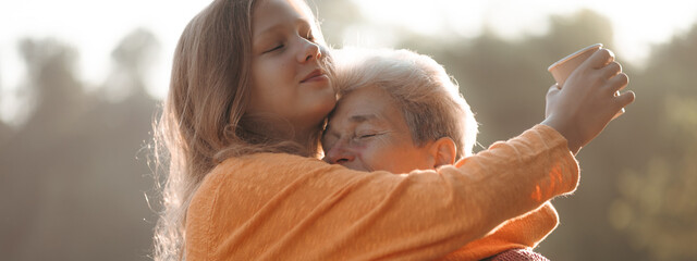 happiness female childhood family bonding mother lifestyle at nature outdoors, children daughter girl having affectionate embracing love with eltern woman, cheerful hug and smiling togetherness