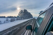 View from the window of a car moving along a winter highway