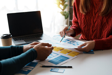 designers, programmers, and mobile application developers work together to innovate modern and relev