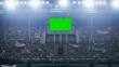 © Gorodenkoff - Stadium Championship Match: Scoreboard Green Chroma Key Screen. Crowd of Fans Cheering, Having Fun. Sport Channel Television Advertising Mock-Up. Content for Digital Devices Display Concept. Wide Shot