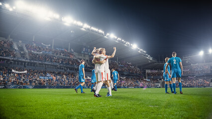 Football Championship: White Team Forward Hits the Ball and Scores Perfect Goal. Goalkeeper Jumps and Fails to Catch, Protect Goals. Teammates Celebrating Victory With a Hug. Beautiful Cinematic Edit.