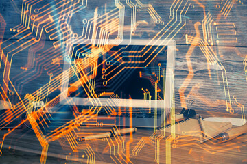 Fototapete - Computer on desktop in office with technology theme hologram. Multi exposure. Tech concept.