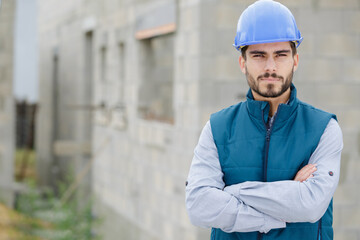 male engineer or architect with crossed arms