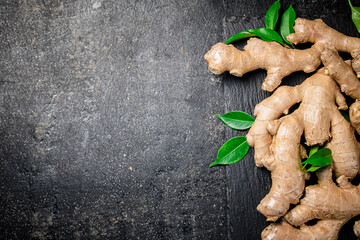 Canvas Print - Fresh ginger root with leaves. 