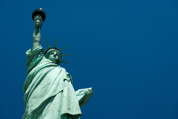 statue of liberty and blue skies