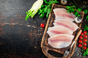 Wall Mural - Raw fish fillet with tomatoes and herbs. 