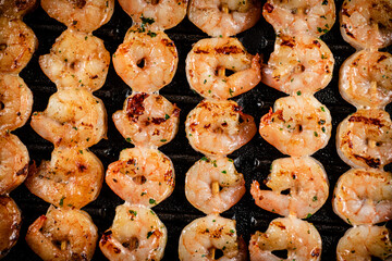 Sticker - Delicious grilled shrimp. Macro background.