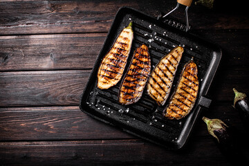 Poster - Pieces of eggplant grilled in a grill pan. 