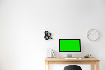 Poster - Computer display with chroma key on desk in room. Comfortable workplace