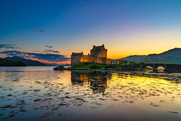 Sticker - Eilean Donan Castle at sunset in Scotland