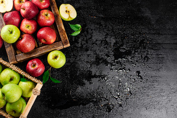 Poster - An assortment of red and green apples on the table. 