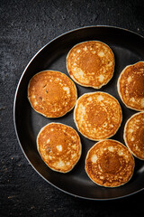 Sticker - Homemade pancakes in a frying pan. 