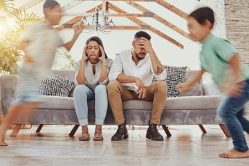 Sticker - Tired parents, kids running and family in a living room feeling anxiety, headache and stress. Children chaos, run and fatigue of mom and father together on a couch frustrated from parent care