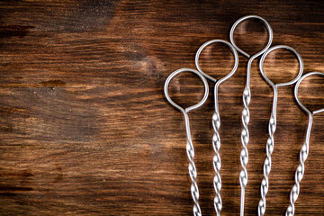 Poster - Skewers for kebab on the table.