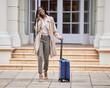 © Rethea B/peopleimages.com - Travel, business phone call and black woman with suitcase in city for conference, global meeting or work trip. Corporate work, hotel and girl talking on smartphone for cab, taxi and transport service