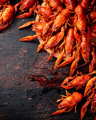 Canvas Print - Boiled crayfish on a cutting board. 