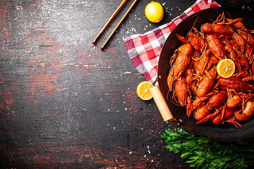 Wall Mural - A pot of boiled crayfish on a napkin. 