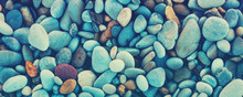 Abstract Nature Pebbles Background. Stone Background. Sea Pebble Beach. Beautiful Nature. Turquoise Color Horizontal Banner