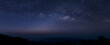 © kanpisut - Panorama view universe space and milky way galaxy with stars on night sky background.